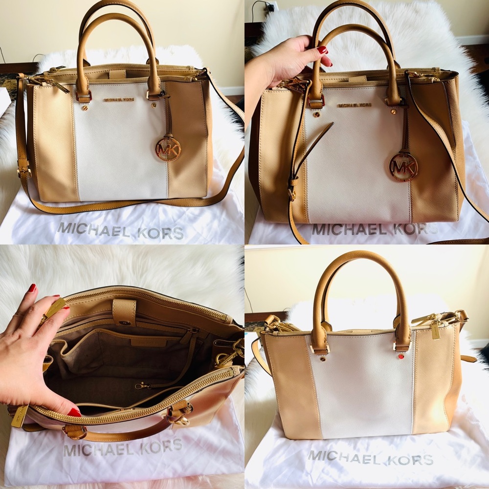 Micheal Kors tan and white purse good as new